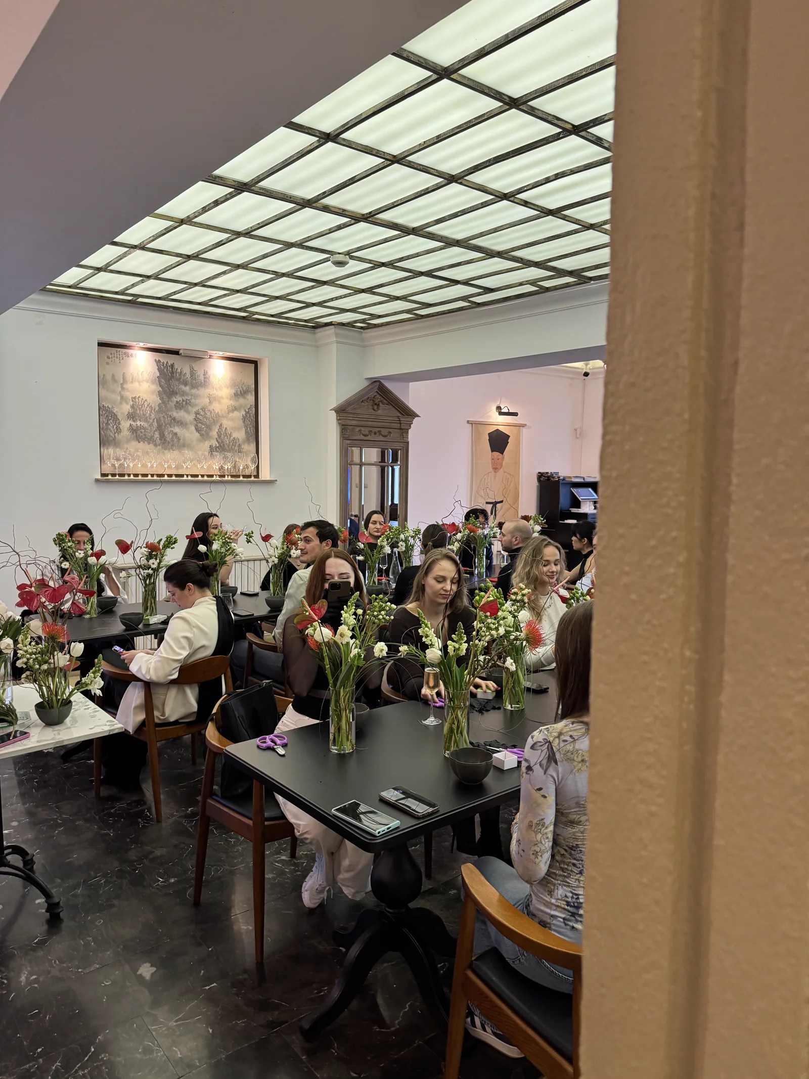 Guests creating bouquets at a floral masterclass
