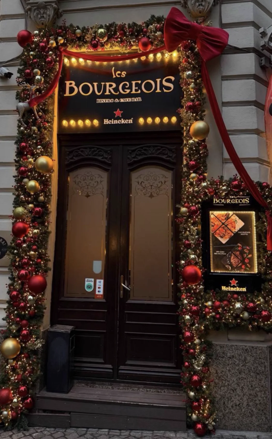 Festive winter facade with garlands and ornaments