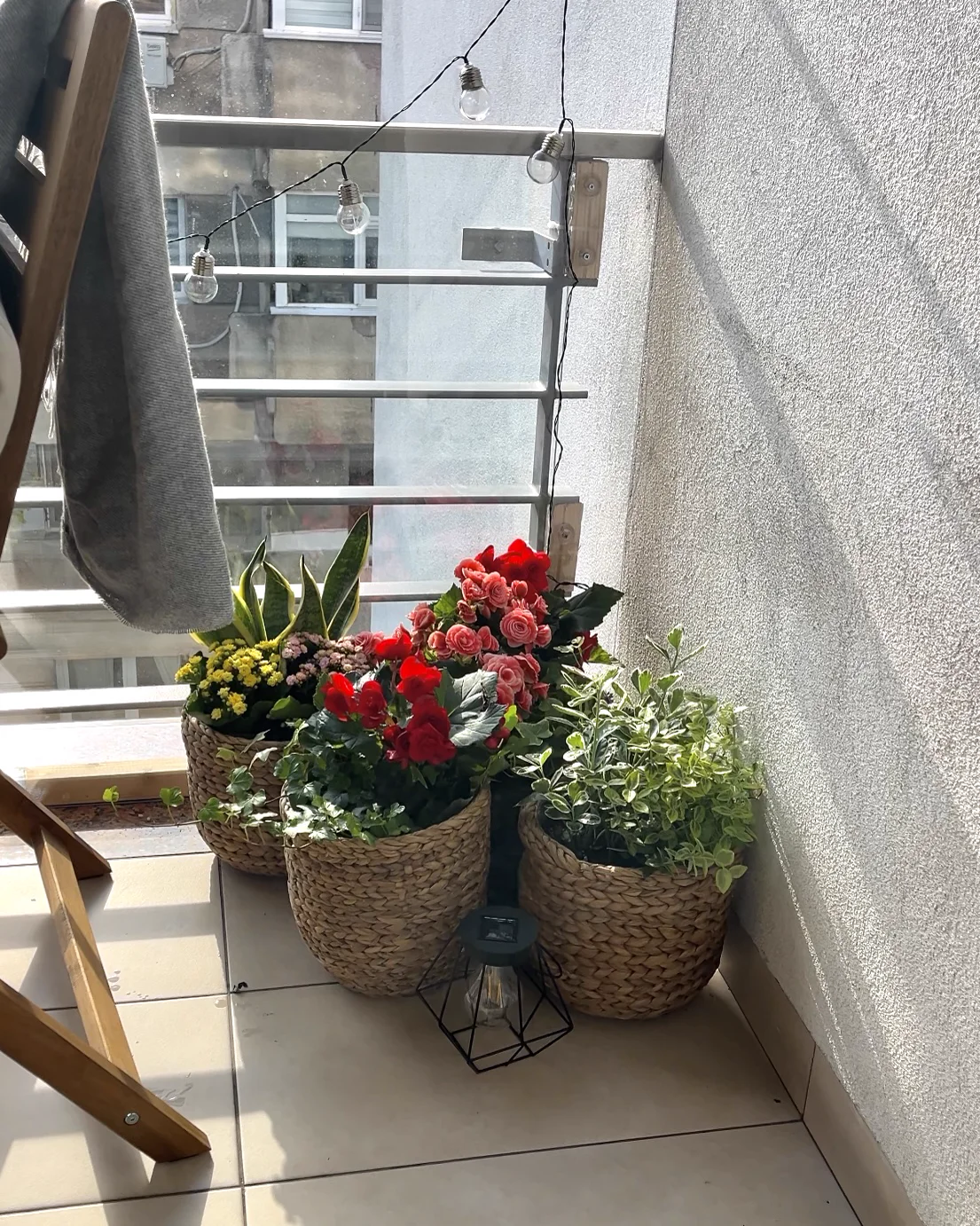 Balcony corner with flowering plants